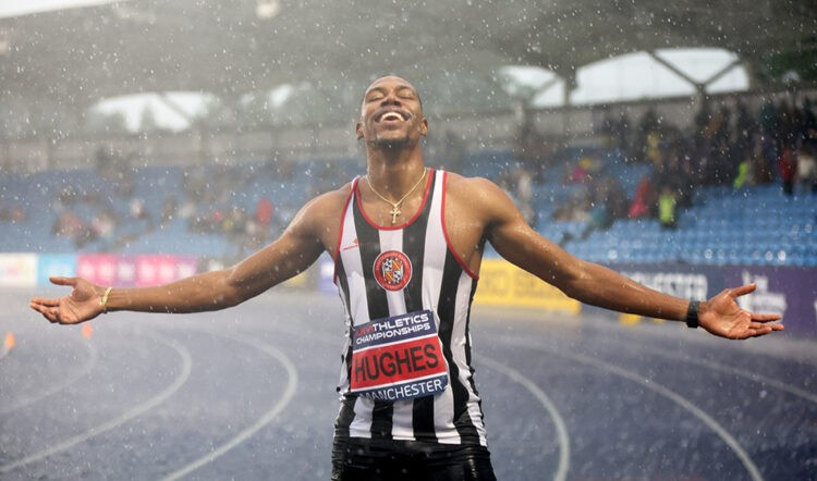 Record-holder Hughes runs to British title in lashing rain