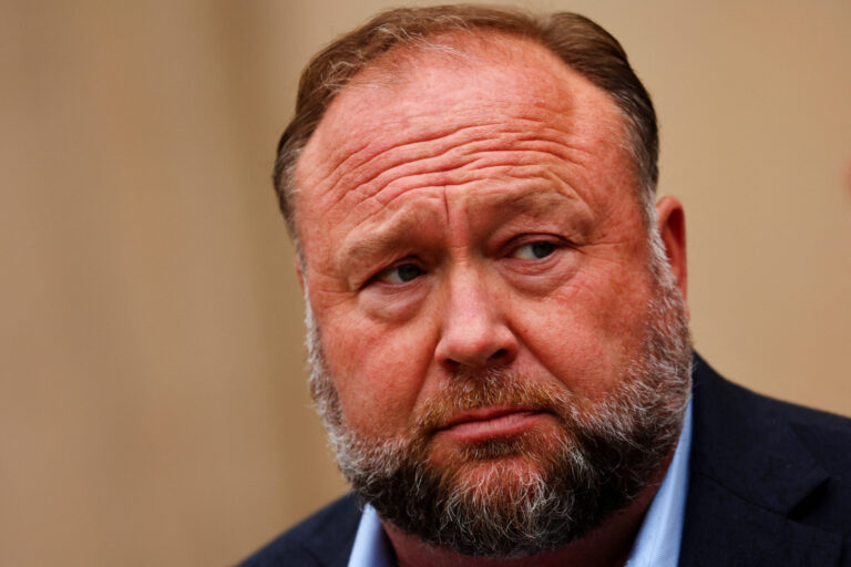 FILE PHOTO: Infowars founder Alex Jones speaks after appearing at his Sandy Hook defamation trial in Waterbury