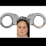 A teacher who fosters 7 arrested, charged with cruelty to children, police say