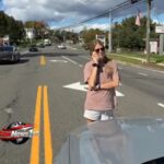 Woman calls man the N word after traffic dispute then calls cops and tells them she is afraid.